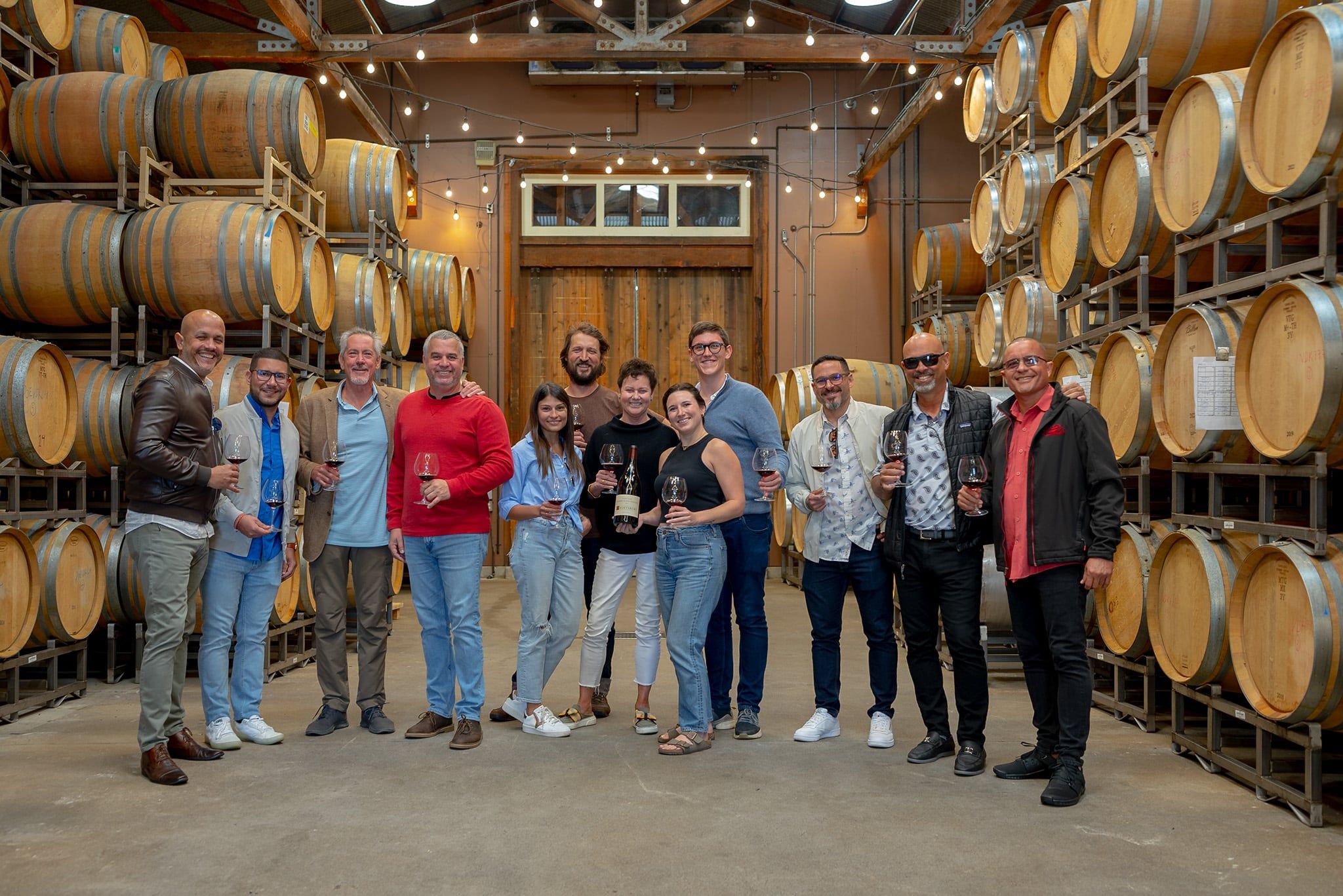 The Plaza Cellars team touring the Saintsbury cellar.